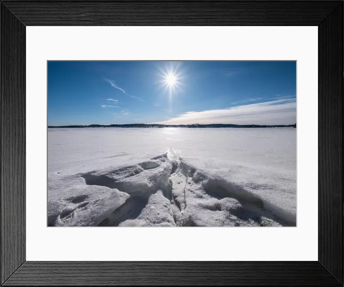 Framed Print : Scenic winter landscape with bright sunlight and sun at winter day in lake Finland Framed Print : Scenic winter landscape with bright sunlight and sun at winter day in lake Finland