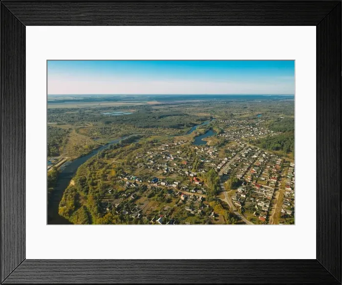 Framed Print : Dobrush, Gomel Region, Belarus. Aerial View Of Dobrush Cityscape Skyline In Summer Day. Residential District And River In Bird's-eye View Framed Print : Dobrush, Gomel Region, Belarus. Aerial View Of Dobrush Cityscape Skyline In Summer Day. Residential District And River In Bird's-eye View