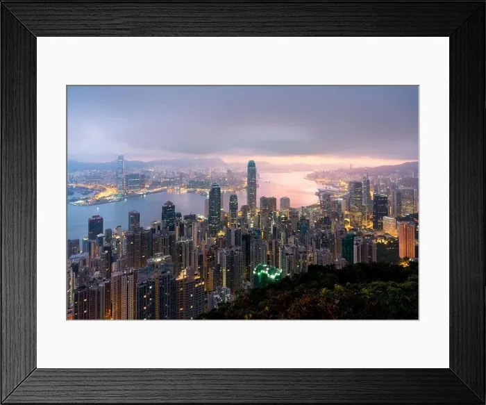 Framed Print : Sunrise over Hong Kong Victoria Harbor from Victoria Peak with Hong Kong and Kowloon below. Asian tourism, modern city life, or business finance and e Framed Print : Sunrise over Hong Kong Victoria Harbor from Victoria Peak with Hong Kong and Kowloon below. Asian tourism, modern city life, or business finance and e