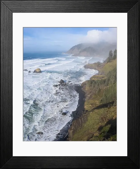 Framed Print : The Pacific Ocean washes against the rocky coastline of northern Oregon. This beautiful, wild region is often covered by a dark foggy marine layer Framed Print : The Pacific Ocean washes against the rocky coastline of northern Oregon. This beautiful, wild region is often covered by a dark foggy marine layer