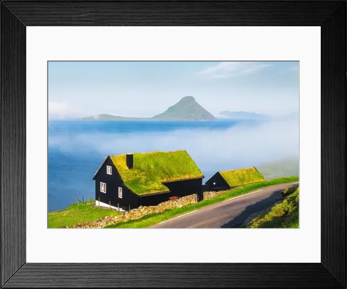Framed Print : Foggy morning view of a house with typical turf-top grass roof in the Velbastadur village on Streymoy island, Faroe islands, Denmark Framed Print : Foggy morning view of a house with typical turf-top grass roof in the Velbastadur village on Streymoy island, Faroe islands, Denmark