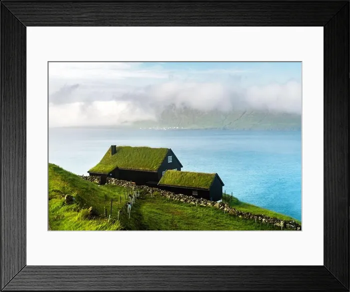 Framed Print : Foggy morning view of a house with grass roof in the Velbastadur village on Streymoy island, Faroe islands, Denmark. Landscape photography Framed Print : Foggy morning view of a house with grass roof in the Velbastadur village on Streymoy island, Faroe islands, Denmark. Landscape photography