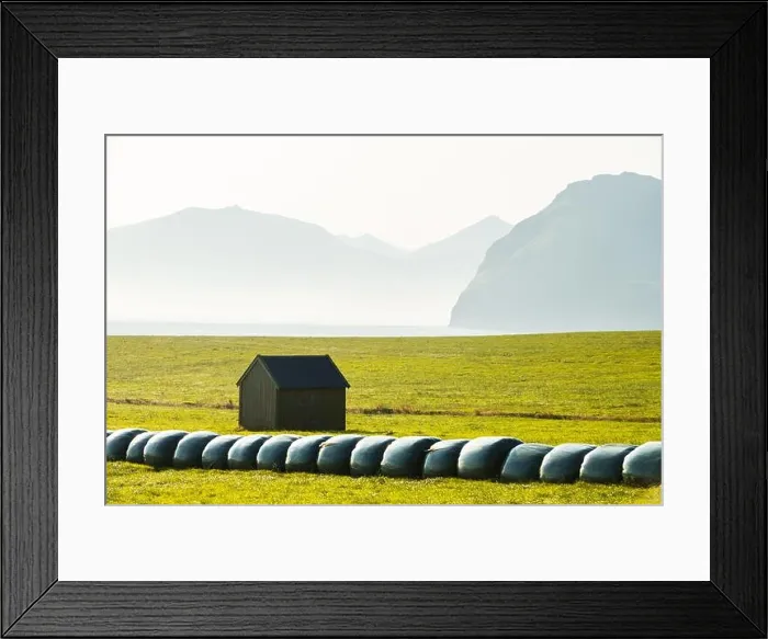 Framed Print : Rural scene with farm field and hay stacks on the Faroe Islands Framed Print : Rural scene with farm field and hay stacks on the Faroe Islands