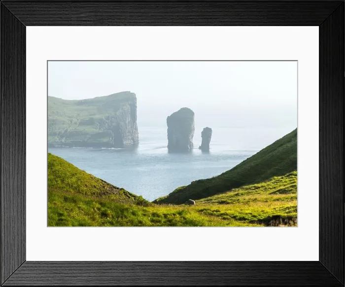 Framed Print : Dramatic view on Drangarnir and Tindholmur sea stacks in Atlantic ocean from Vagar island, Faroe Islands. Landscape photography Framed Print : Dramatic view on Drangarnir and Tindholmur sea stacks in Atlantic ocean from Vagar island, Faroe Islands. Landscape photography