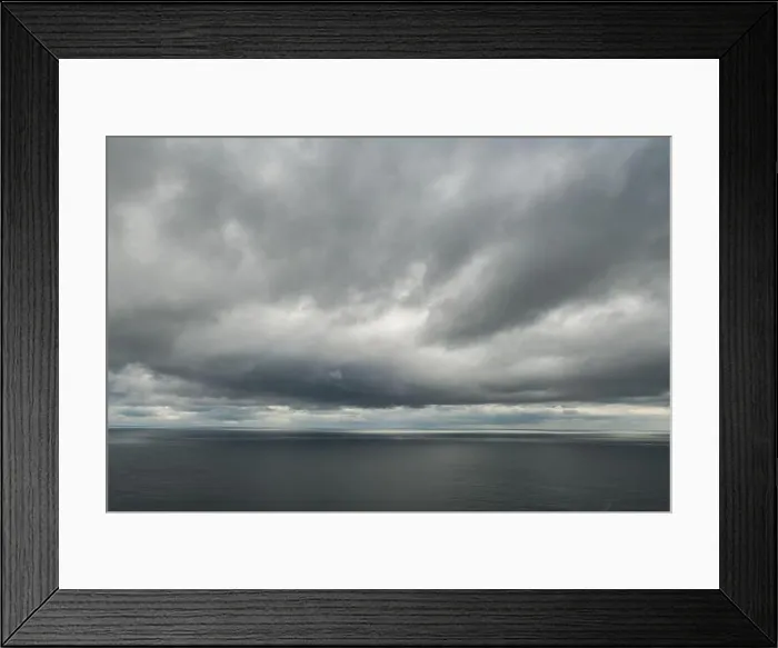 Framed Print : Atlantic ocean water and dramatic cloudy sky background. Sea water texture closeup. Landscape photography