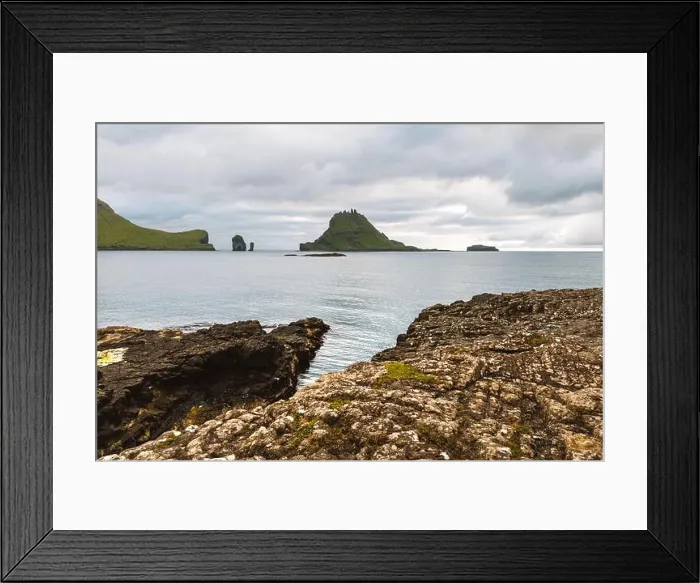 Framed Print : Dramatic view on Drangarnir and Tindholmur sea stacks in Atlantic ocean from Vagar island, Faroe Islands. Landscape photography Framed Print : Dramatic view on Drangarnir and Tindholmur sea stacks in Atlantic ocean from Vagar island, Faroe Islands. Landscape photography