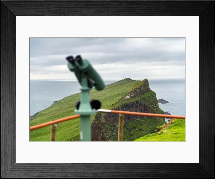 Framed Print : Foggy view of old lighthouse from viewpoint with tourist binoculars on the Mykines island, Faroe islands, Denmark. Landscape photography Framed Print : Foggy view of old lighthouse from viewpoint with tourist binoculars on the Mykines island, Faroe islands, Denmark. Landscape photography