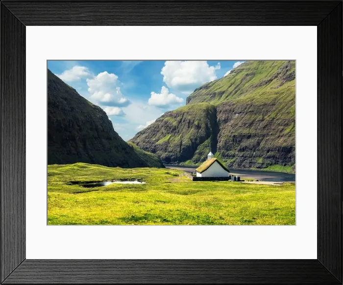 Framed Print : Summer view of traditional turf-top church Saksunar Kirkja in Saksun village. Beauty landscape with Pollurin Laguna and high mountains Framed Print : Summer view of traditional turf-top church Saksunar Kirkja in Saksun village. Beauty landscape with Pollurin Laguna and high mountains