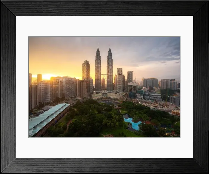 Framed Print : Kuala Lumpur city skyscraper and green space park with nice sky sunset at downtown business district in Kuala Lumpur. Malaysia. Malaysia tourism, mode Framed Print : Kuala Lumpur city skyscraper and green space park with nice sky sunset at downtown business district in Kuala Lumpur. Malaysia. Malaysia tourism, mode