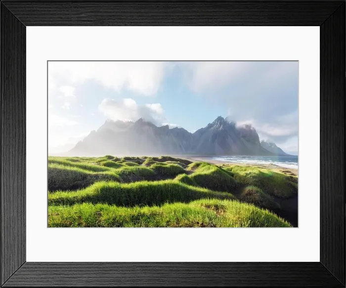 Framed Print : Gorgeous landscape with black sand desert dunes and grassy bumps near famous Stokksnes mountains on Vestrahorn cape, Iceland Framed Print : Gorgeous landscape with black sand desert dunes and grassy bumps near famous Stokksnes mountains on Vestrahorn cape, Iceland