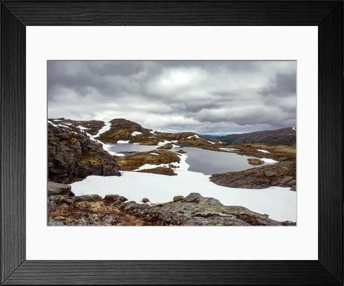 Framed Print : Typical norwegian landscape with snowy mountains and clear lake near the famous Aurlandsvegen (Bjorgavegen), mountain road, Aurland, Norway Framed Print : Typical norwegian landscape with snowy mountains and clear lake near the famous Aurlandsvegen (Bjorgavegen), mountain road, Aurland, Norway