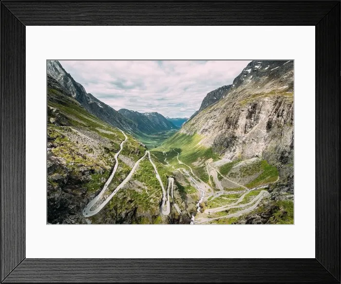 Framed Print : Trollstigen, Andalsnes, Norway. Serpentine Mountain Road Trollstigen. Famous Norwegian Landmark And Popular Destination. Norwegian County Road 63 In S Framed Print : Trollstigen, Andalsnes, Norway. Serpentine Mountain Road Trollstigen. Famous Norwegian Landmark And Popular Destination. Norwegian County Road 63 In S