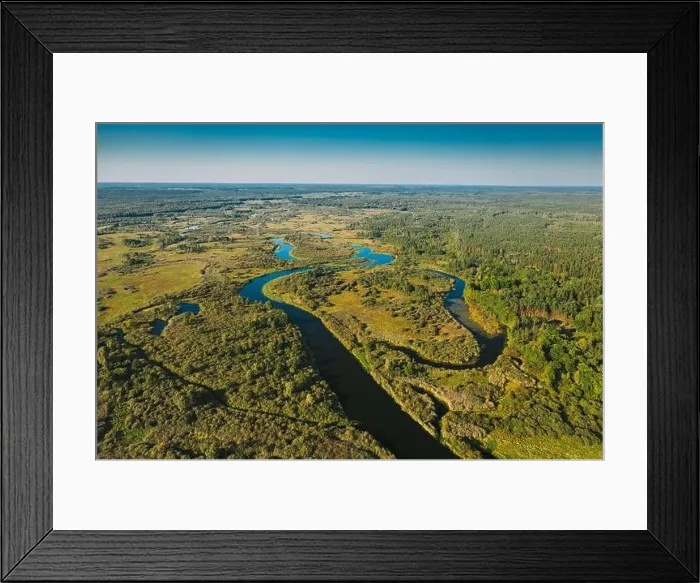 Framed Print : Aerial View Green Forest Woods And River Landscape In Sunny Summer Day. Top View Of Beautiful European Nature From High Attitude In Summer Season. Dro Framed Print : Aerial View Green Forest Woods And River Landscape In Sunny Summer Day. Top View Of Beautiful European Nature From High Attitude In Summer Season. Dro