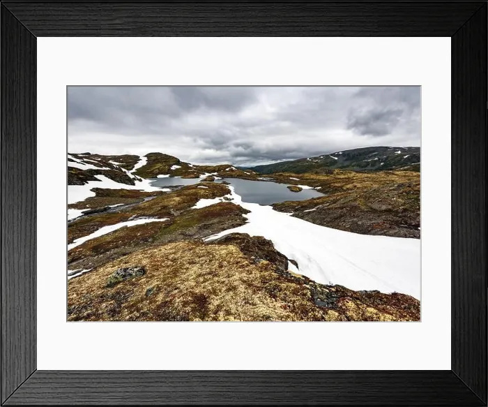 Framed Print : Typical norwegian landscape with snowy mountains and clear lake near the famous Aurlandsvegen (Bjorgavegen), mountain road, Aurland, Norway Framed Print : Typical norwegian landscape with snowy mountains and clear lake near the famous Aurlandsvegen (Bjorgavegen), mountain road, Aurland, Norway