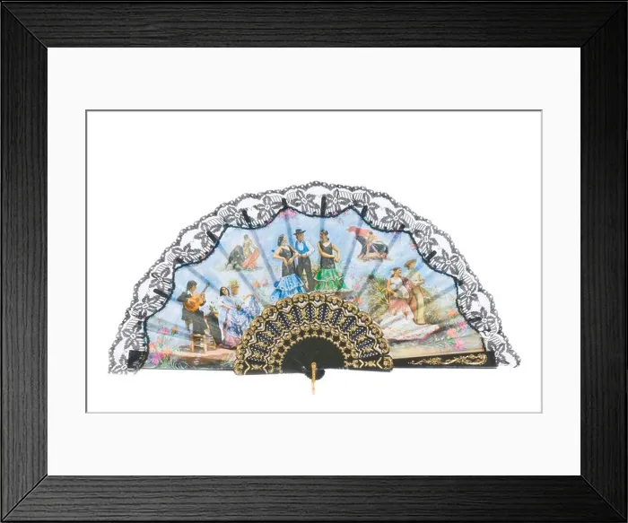 Framed Print : A Spanish hand held fan cheap holiday souvenir on a pure white (255) background Framed Print : A Spanish hand held fan cheap holiday souvenir on a pure white (255) background