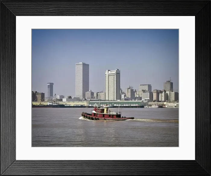 Framed Print : 1970s CENTER CITY SKYLINE WITH TUG BOAT ON MISSISSIPPI RIVER IN FOREGROUND NEW ORLEANS LOUISIANA USA - kr28018 GRD001 HARS EDIFICE MUDDY WATERFRONT Framed Print : 1970s CENTER CITY SKYLINE WITH TUG BOAT ON MISSISSIPPI RIVER IN FOREGROUND NEW ORLEANS LOUISIANA USA - kr28018 GRD001 HARS EDIFICE MUDDY WATERFRONT