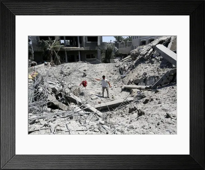 Framed Print : (240728) -- GAZA, July 28, 2024 (Xinhua) -- A man stands among the rubble of a field hospital attacked by Israeli army in Deir al-Balah Framed Print : (240728) -- GAZA, July 28, 2024 (Xinhua) -- A man stands among the rubble of a field hospital attacked by Israeli army in Deir al-Balah
