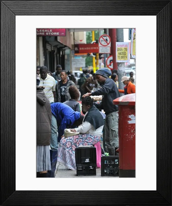 Framed Print : Informal sector, a hairdresser on the street in the centre of Johannesburg, South Africa, Africa