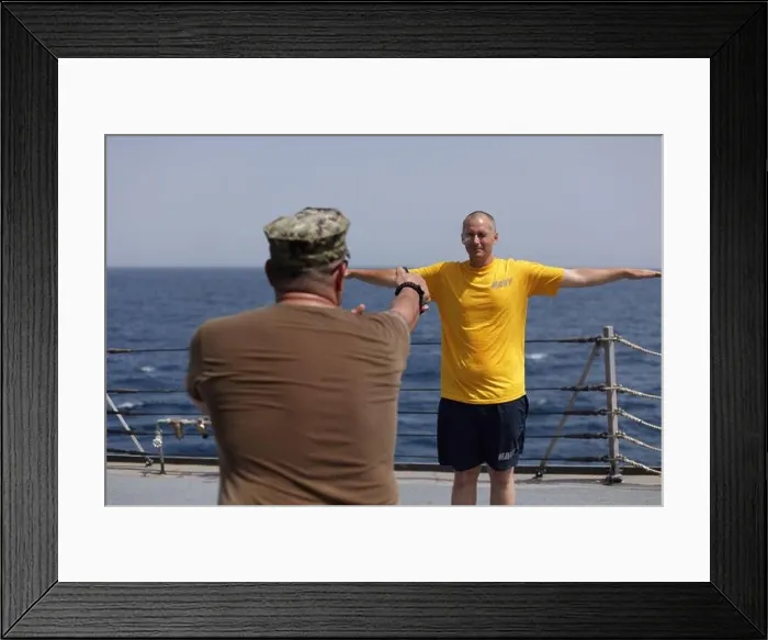Framed Print : 220509-N-IN734-1104 GULF OF OMAN (May 09, 2022) Seaman Apprentice Daniel Kniffen receives oleoresin capiscum spray during an oleoresin capiscum Framed Print : 220509-N-IN734-1104 GULF OF OMAN (May 09, 2022) Seaman Apprentice Daniel Kniffen receives oleoresin capiscum spray during an oleoresin capiscum
