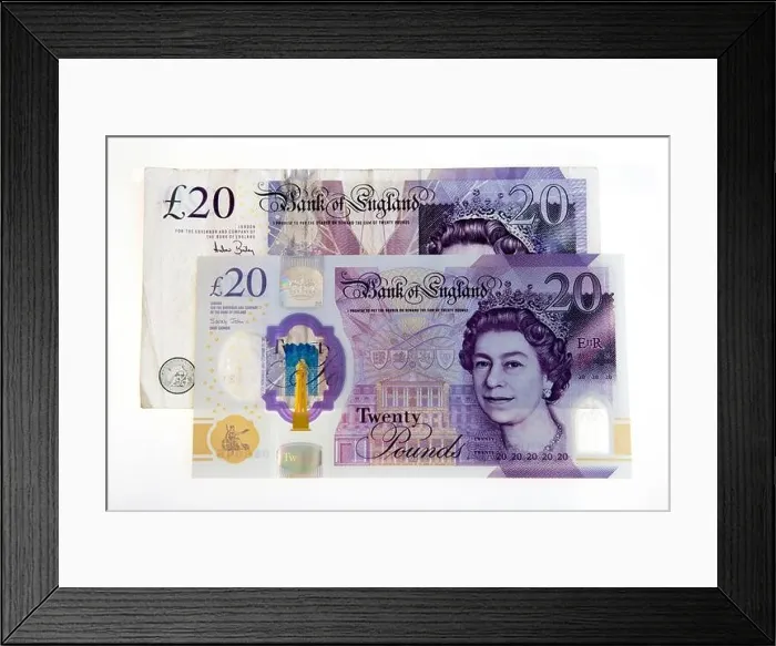 Framed Print : New 2020 British twenty pound note and old paper note together Framed Print : New 2020 British twenty pound note and old paper note together