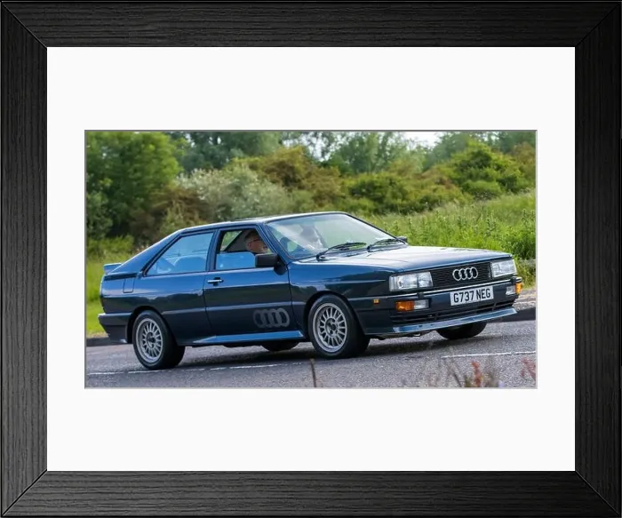 Framed Print : Stony Stratford, UK - June 4th 2023: 1989 AUDI QUATTRO classic car travelling on an English country road Framed Print : Stony Stratford, UK - June 4th 2023: 1989 AUDI QUATTRO classic car travelling on an English country road
