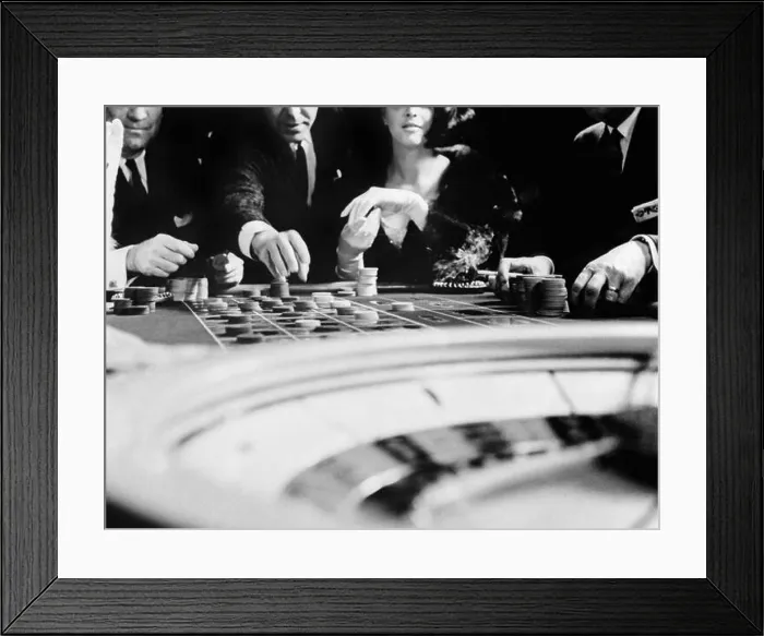 Framed Print : 1960s FOUR ANONYMOUS UNIDENTIFIED PEOPLE GAMBLING CASINO ROULETTE Framed Print : 1960s FOUR ANONYMOUS UNIDENTIFIED PEOPLE GAMBLING CASINO ROULETTE