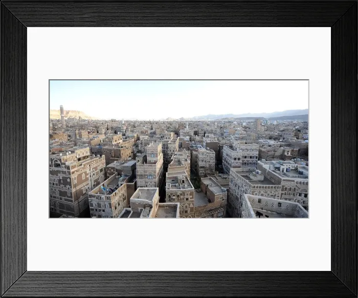 Framed Print : Views across the old city of Sana'a, the capital of Yemen, showing the typical red and white brick built houses Framed Print : Views across the old city of Sana'a, the capital of Yemen, showing the typical red and white brick built houses