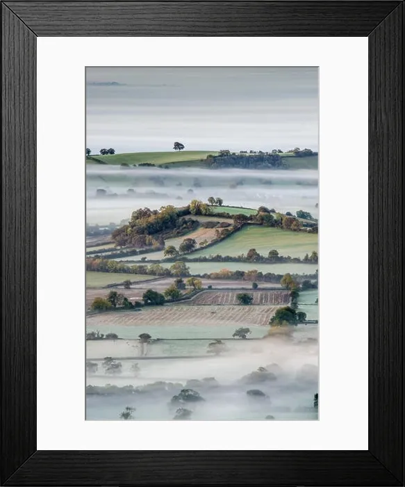 Framed Print : SOMERSET, UK: Fog blankets the Mendip Hills. HAUNTING pictures show legendary Avalon brought to life by a breath of fog