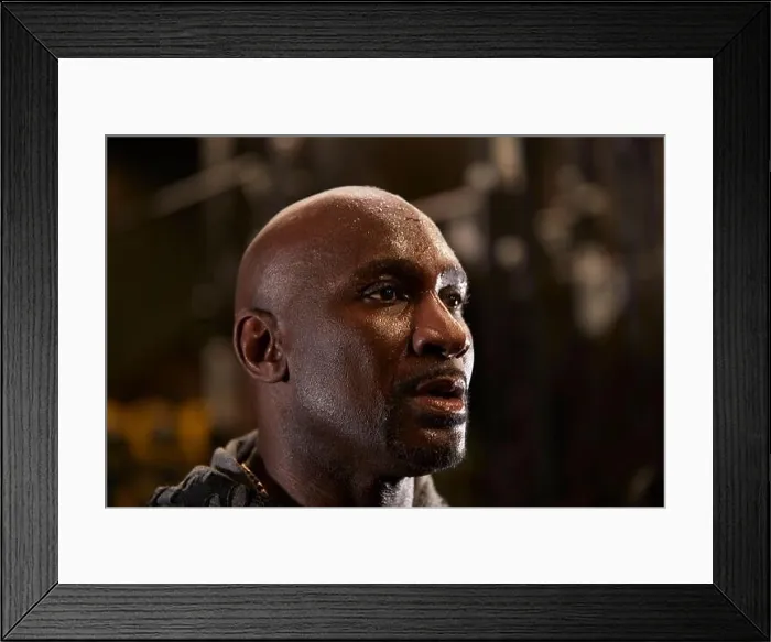 Framed Print : Close-up of man with sweat on face in gym