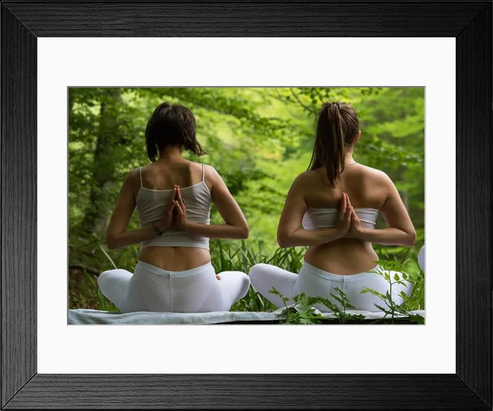 Framed Print : Two girls doing yoga in nature Framed Print : Two girls doing yoga in nature