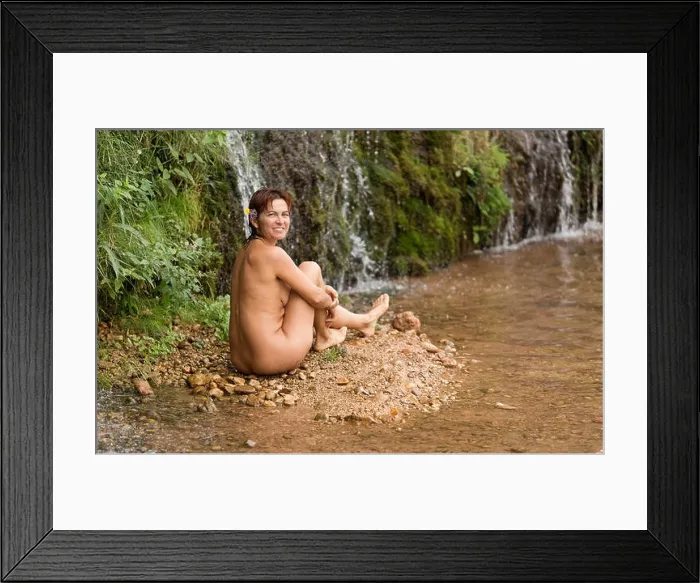 Framed Print : Woman of 40 years sitting without clothes in the river World in Lietor in the province of Albacete, Spain Framed Print : Woman of 40 years sitting without clothes in the river World in Lietor in the province of Albacete, Spain