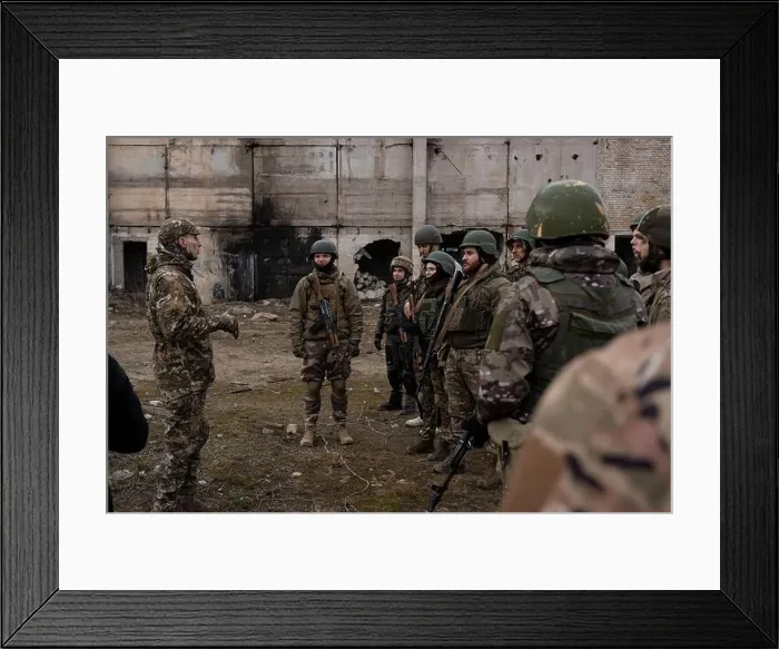 Framed Print : March 15, 2024, Kyiv, Ukraine: A group of trainees listens to the military instructor in a training organised by the third separate assault brigade Framed Print : March 15, 2024, Kyiv, Ukraine: A group of trainees listens to the military instructor in a training organised by the third separate assault brigade