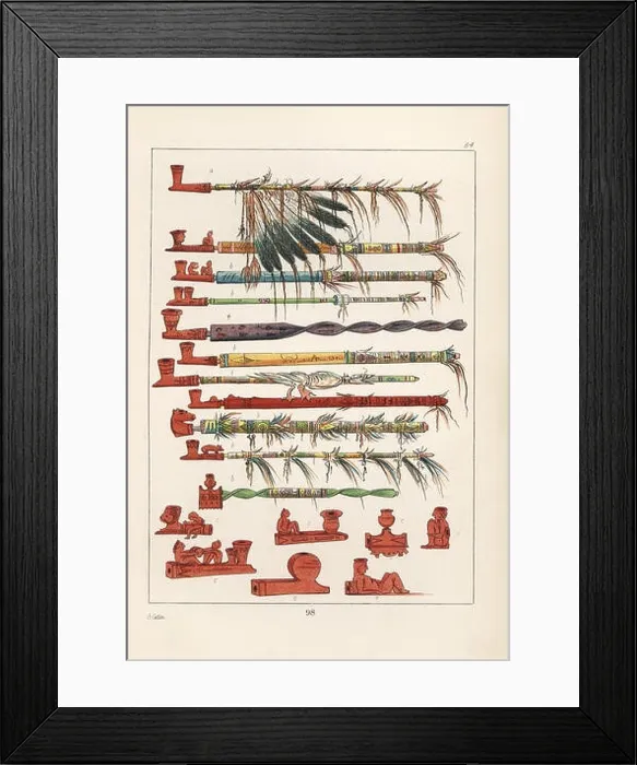 Framed Print : Tobacco pipes of the Native Americans, and a peace pipe with war-eagle feathers at top. The pipes are carved from pipe-stone, red steatite Framed Print : Tobacco pipes of the Native Americans, and a peace pipe with war-eagle feathers at top. The pipes are carved from pipe-stone, red steatite