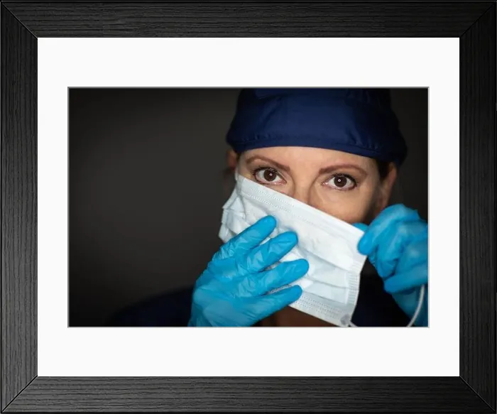 Framed Print : Female Doctor or Nurse Wearing Surgical Gloves Putting On Medical Face Mask Framed Print : Female Doctor or Nurse Wearing Surgical Gloves Putting On Medical Face Mask