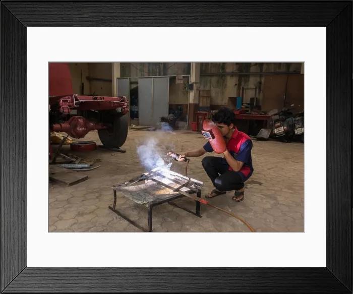 Framed Print : Mumbai, India - July 8, 2018 - Indian boys learning about welding in vocational school Framed Print : Mumbai, India - July 8, 2018 - Indian boys learning about welding in vocational school