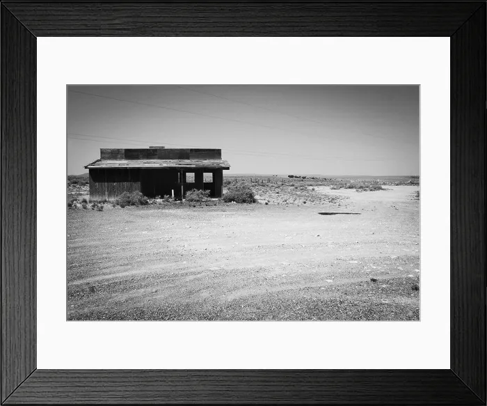 Framed Print : Arizona deserted dirt road wood building landscape architecture at two guns ghost town along route 66 just east of flagstaff