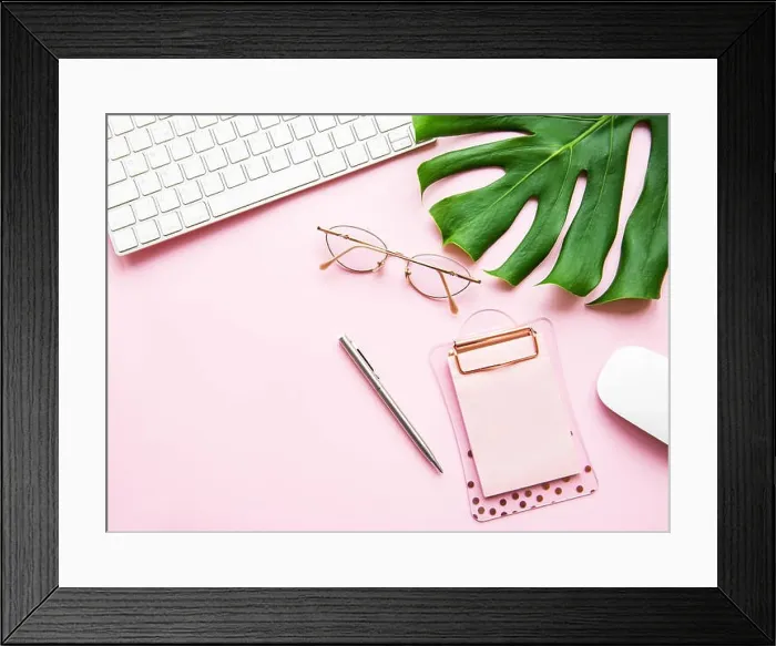 Framed Print : Office desk working space - Flat lay top view of working space with keyboard and notebook on pink pastel background