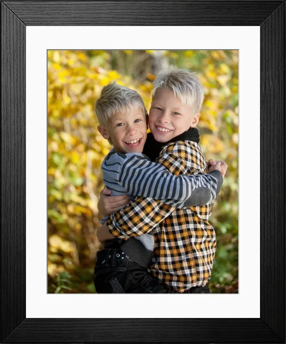 Framed Print : Portrait of two blonde boys hugging outside Framed Print : Portrait of two blonde boys hugging outside