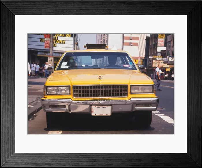 Framed Print : USA, New York City, yellow taxi in the street, front view Framed Print : USA, New York City, yellow taxi in the street, front view
