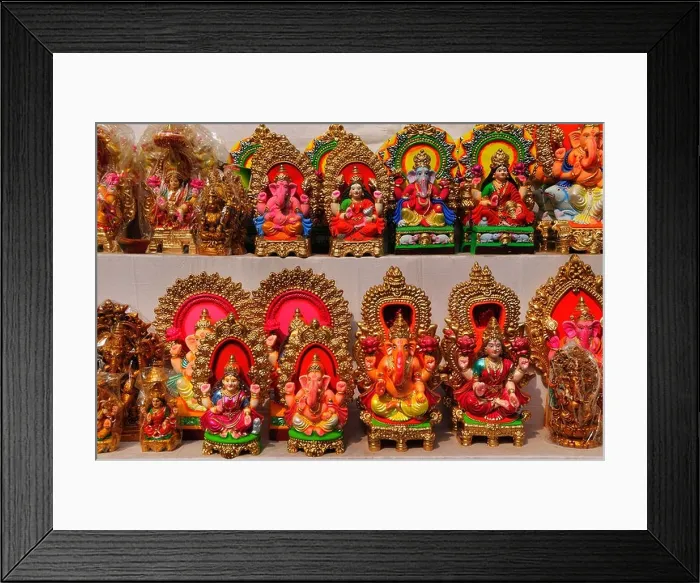Framed Print : Selling Hindu Gods statues at the market a day before Diwali festival in Old Delhi Framed Print : Selling Hindu Gods statues at the market a day before Diwali festival in Old Delhi