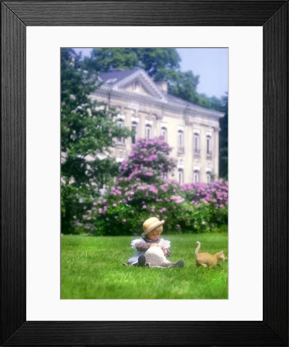 Framed Print : little cute girl in garden with pussy cat Framed Print : little cute girl in garden with pussy cat