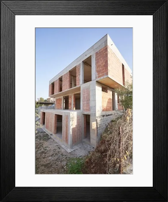 Framed Print : Construction of a modern residential building with flat roof