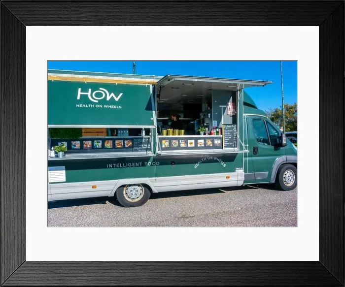 Framed Print : Lisbon, Portugal, Food Trucks on Street Intelligent Food Jardin do Ultramarr near Belem Historic Monument