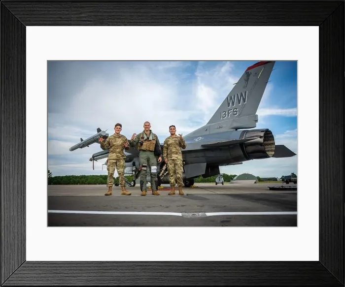 Framed Print : U.S. Air Force Airman 1st Class Nathan Hungate, left, 13th Fighter Generation Squadron (FGS) assistant dedicated crew chief, Lt. Col Framed Print : U.S. Air Force Airman 1st Class Nathan Hungate, left, 13th Fighter Generation Squadron (FGS) assistant dedicated crew chief, Lt. Col