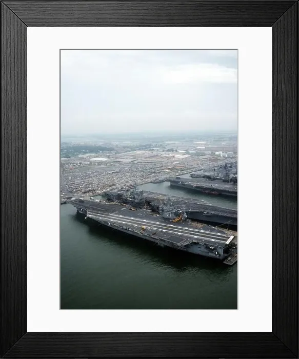 Framed Print : The nuclear-powered aircraft carrier USS THEODORE ROOSEVELT (CVN-71), foreground, lies tied up beside the nuclear-powered aircraft carrier USS DWIGHT Framed Print : The nuclear-powered aircraft carrier USS THEODORE ROOSEVELT (CVN-71), foreground, lies tied up beside the nuclear-powered aircraft carrier USS DWIGHT