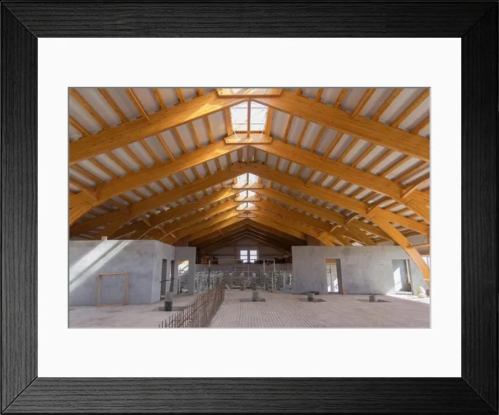 Framed Print : Large hangar. Glued laminated timber construction. Roof construction of laminated veneer lumber. Building. Glued laminated timber. Building. Construct