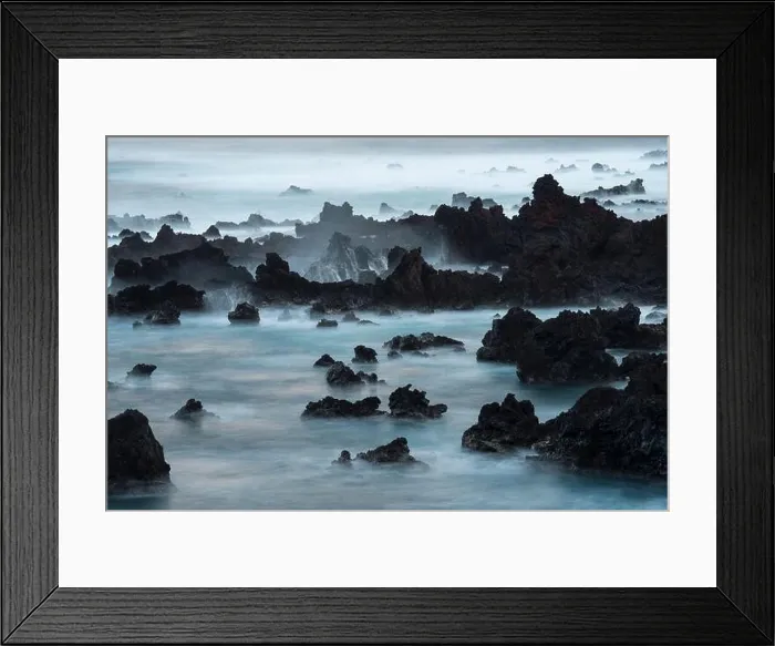 Framed Print : Long exposure of surf pouring over lava rocks at Easter Island; Easter island, Chile Framed Print : Long exposure of surf pouring over lava rocks at Easter Island; Easter island, Chile