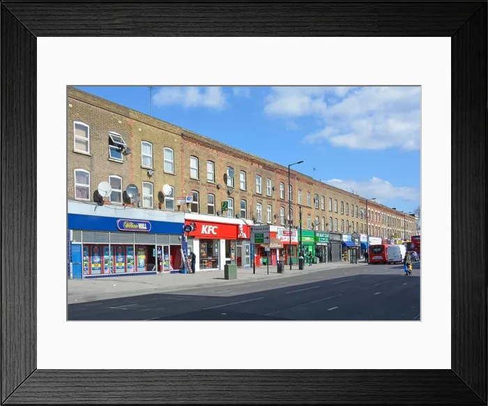 Framed Print : Shopping street and shop units with flats above in Canning Town Framed Print : Shopping street and shop units with flats above in Canning Town