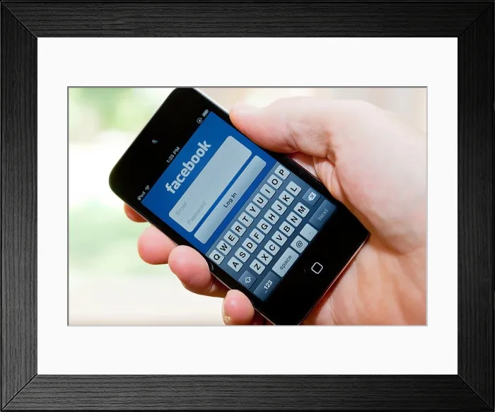 Framed Print : Log in to Facebook on an Apple iPod touch Framed Print : Log in to Facebook on an Apple iPod touch