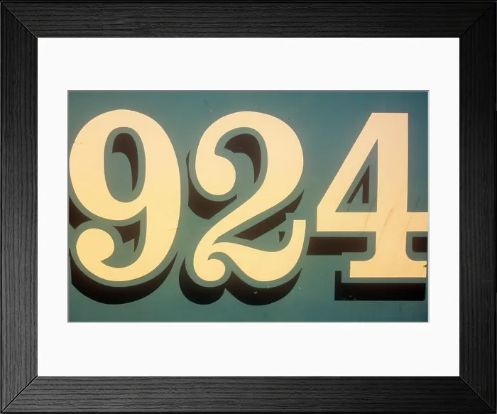 Framed Print : Close up of stylish cream numbers 924 painted to look as though casting shadows on grey-green background Framed Print : Close up of stylish cream numbers 924 painted to look as though casting shadows on grey-green background